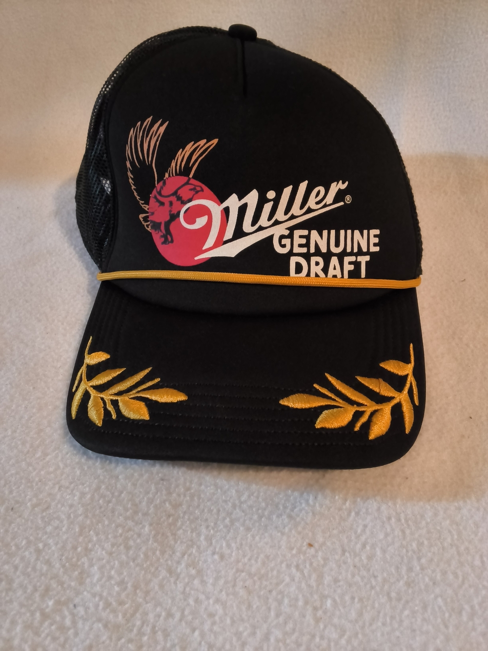 MAD Engine Black Trucker Hat with Yellow Accents and Red Logo
